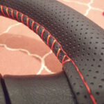 دور فرمون دوختنی چرم سوزنی مدل مشکی دوخت قرمز