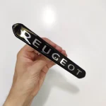 آرم ورد پلیت سپر جلو 206-207 ژله ای – نوشته peugeot